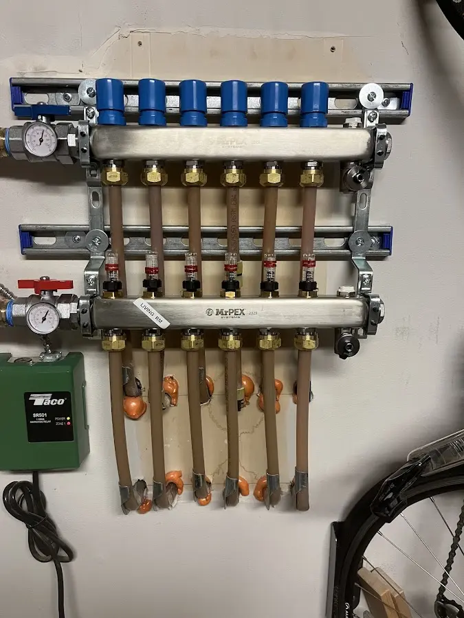 Plumber performing Water Heater Repair at a residential property in Great Falls